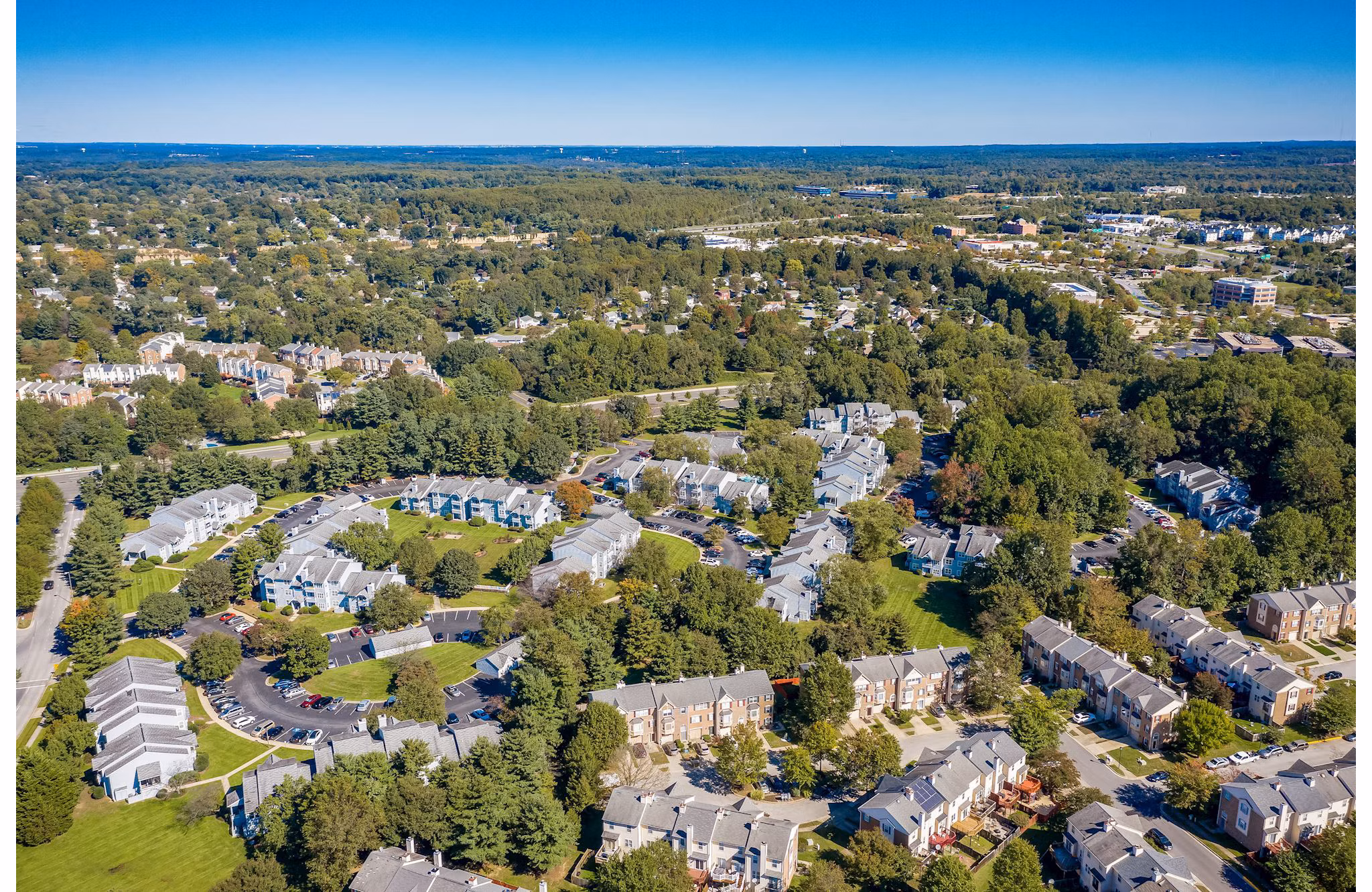 Aerial view of Avana Heather Ridge Apartments: luxury living with green landscapes in Aurora, showcasing modern architecture and community features