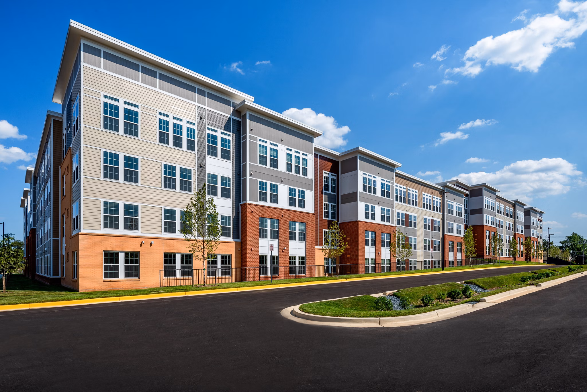 Contemporary clubhouse with chic seating and modern decor at Addison Row apartments, offering amenities for luxury living