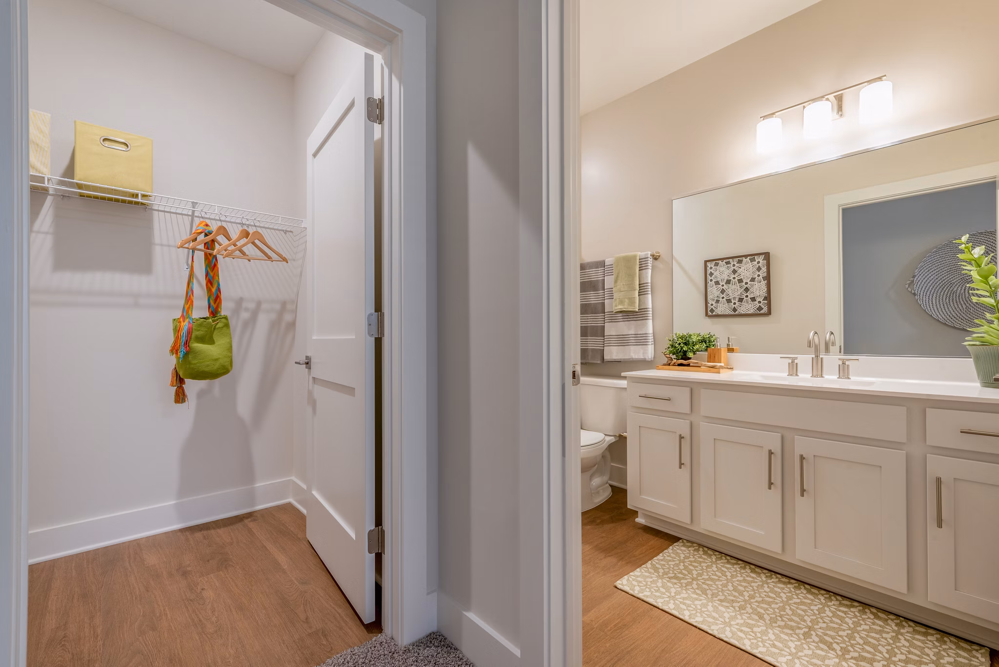 Modern kitchen with stainless steel appliances in GS Addison Row apartments