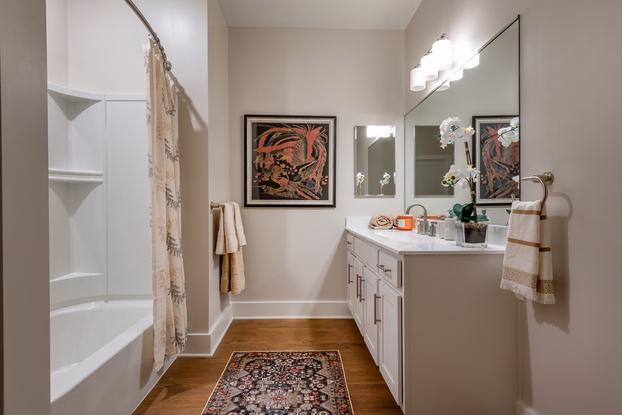 Luxurious bathroom featuring a freestanding tub and stylish vanity in Greystar luxury apartments