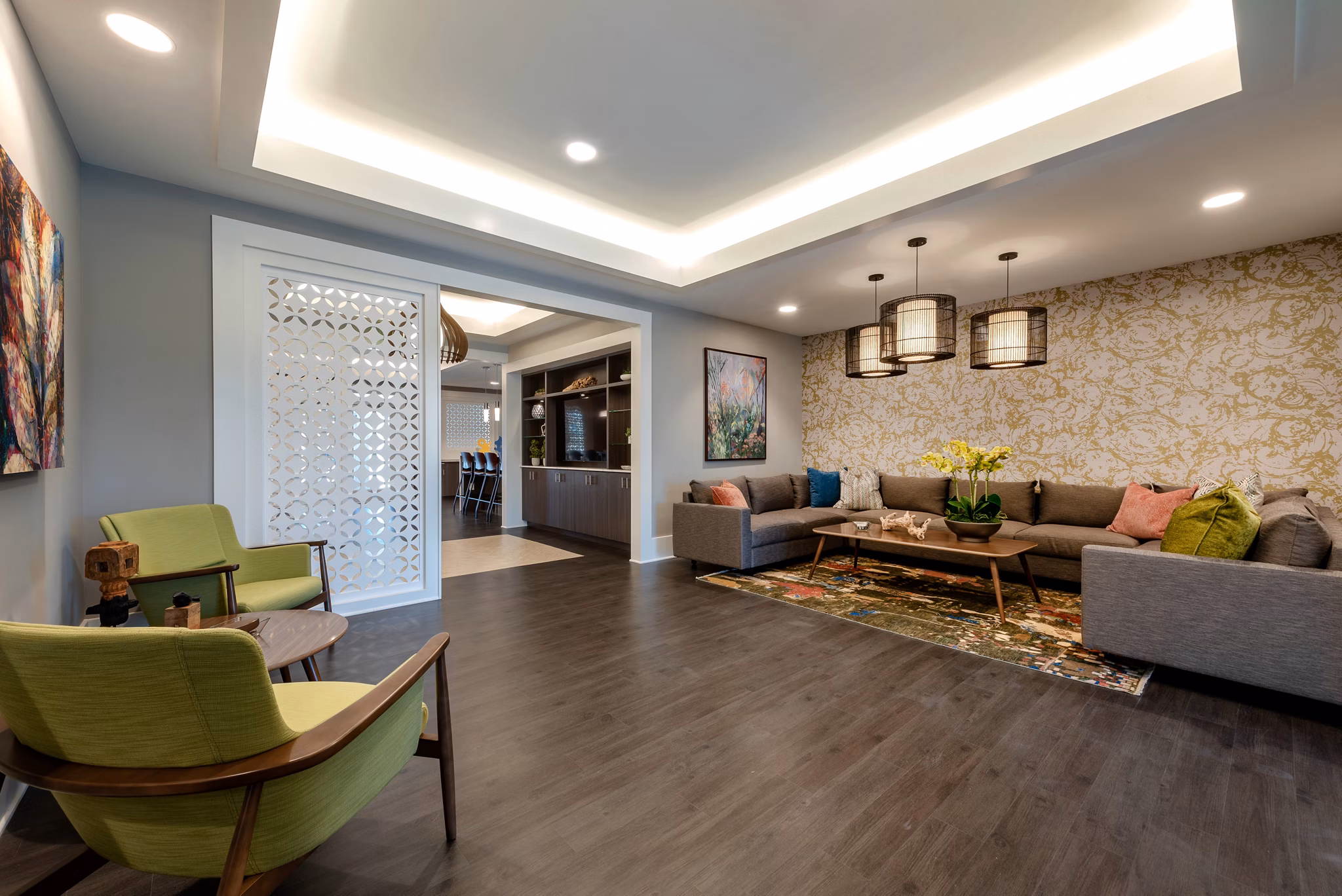 Stylish interior with modern decor and seating at Addison Row, showcasing model apartments and luxury amenities