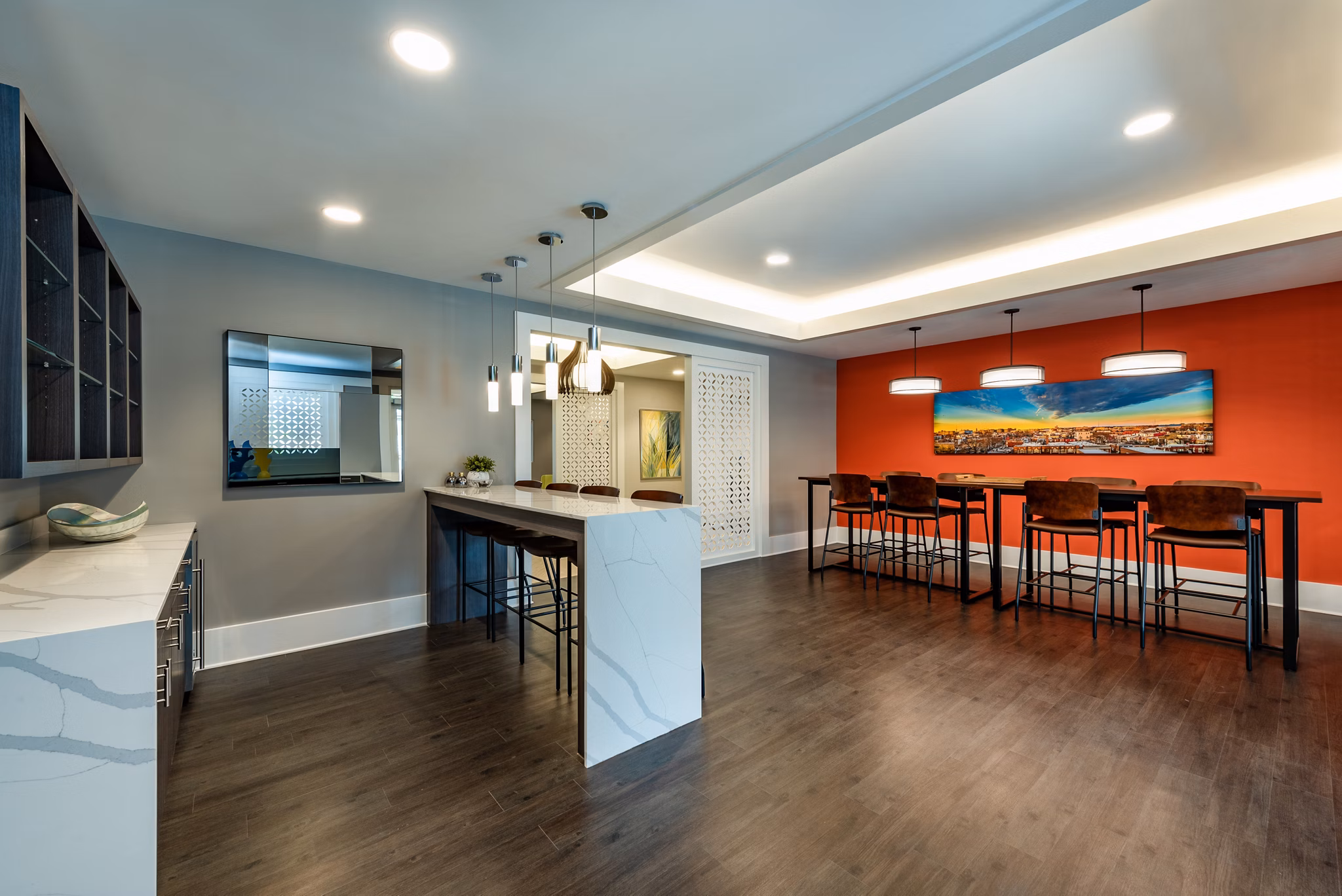 Spacious clubhouse with modern decor and fitness center at GS Addison Row luxury apartments