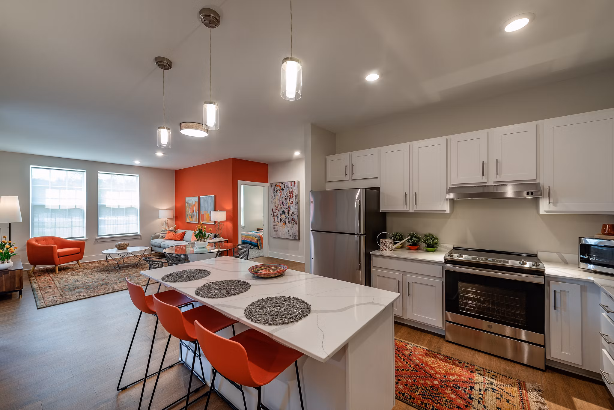 Modern kitchen featuring sleek countertops and stainless steel appliances at Addison Row luxury apartments in Maryland
