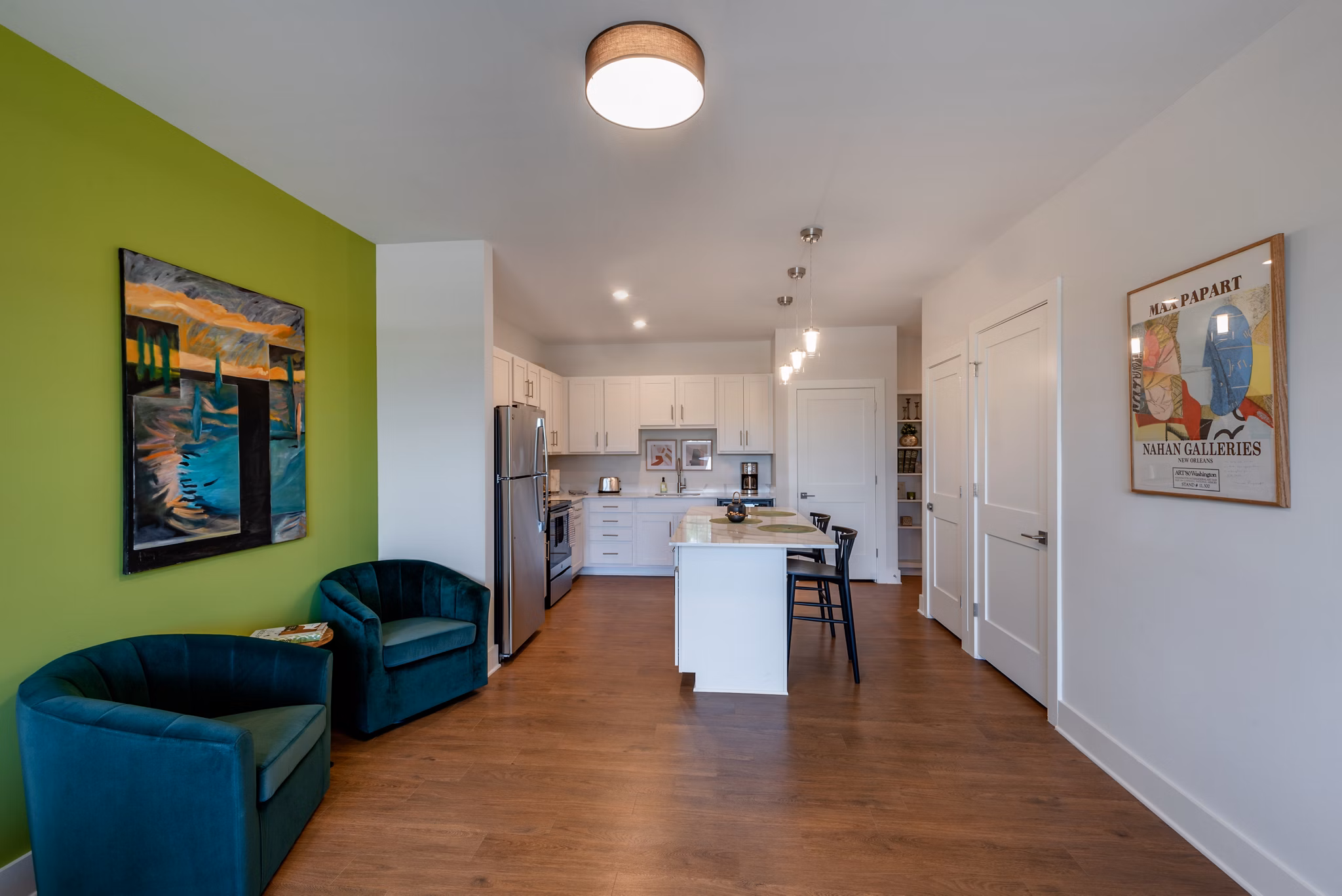 Modern clubhouse with luxurious lounge spaces at Addison Row Apartments, showcasing premium amenities and elegant design