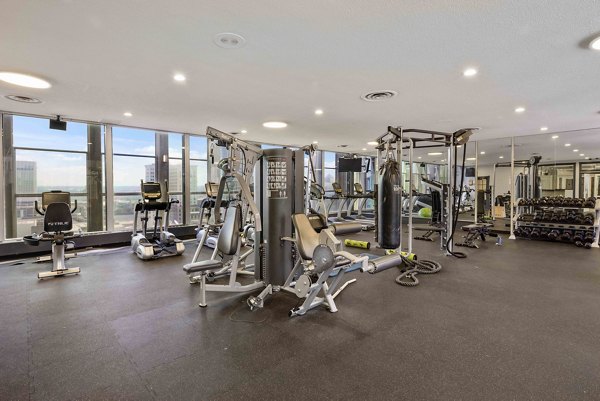 Modern fitness center with state-of-the-art equipment at The Luckman Apartments for luxury living