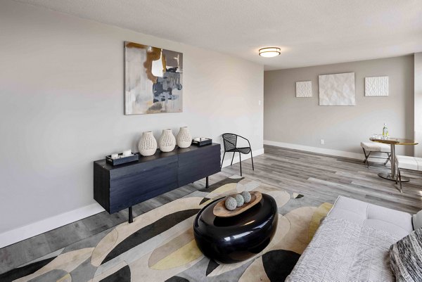 Spacious living room with modern decor at The Luckman Apartments in luxury Greystar communities