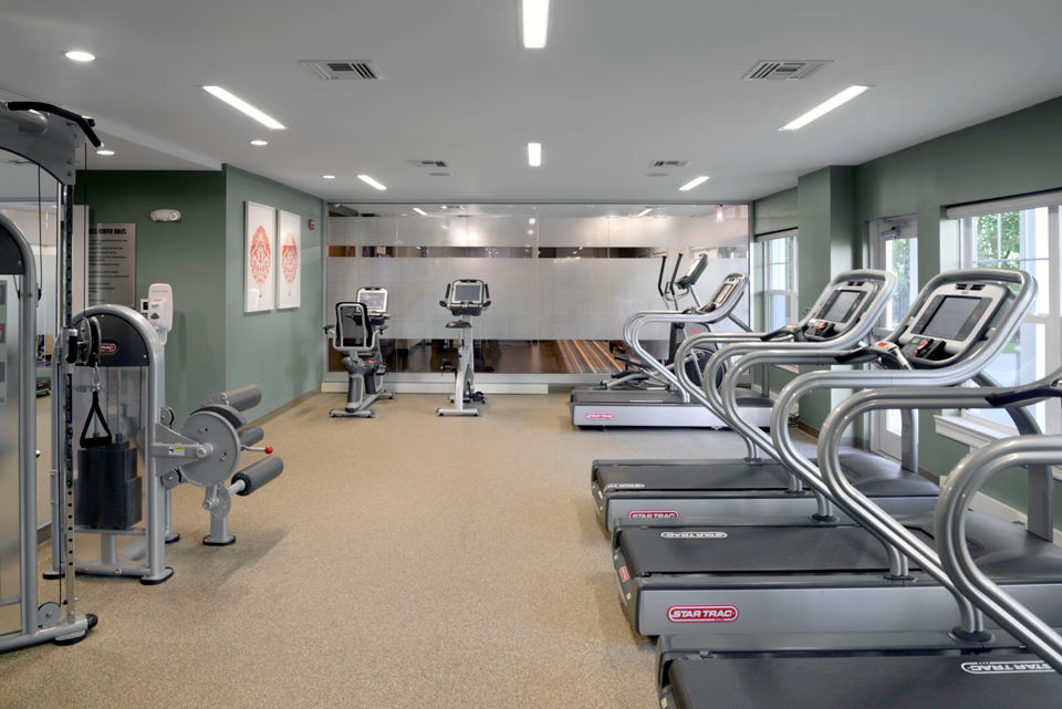 State-of-the-art fitness center with modern equipment at The Village at Bronxville Apartments