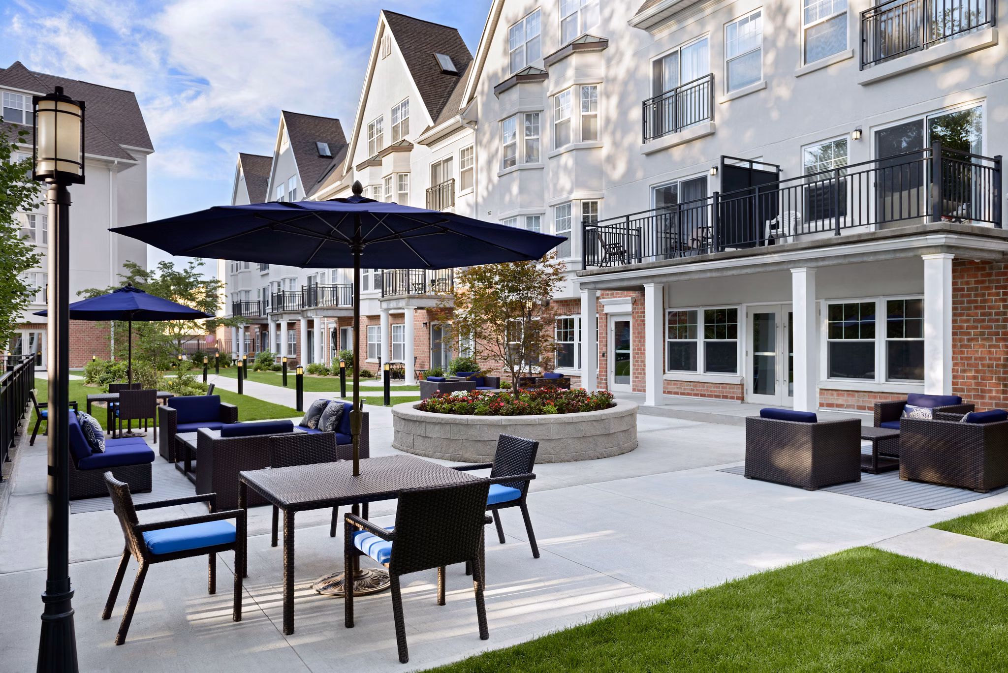 Courtyard at The Village at Bronxville Apartments: Serene outdoor space with seating and landscaped gardens