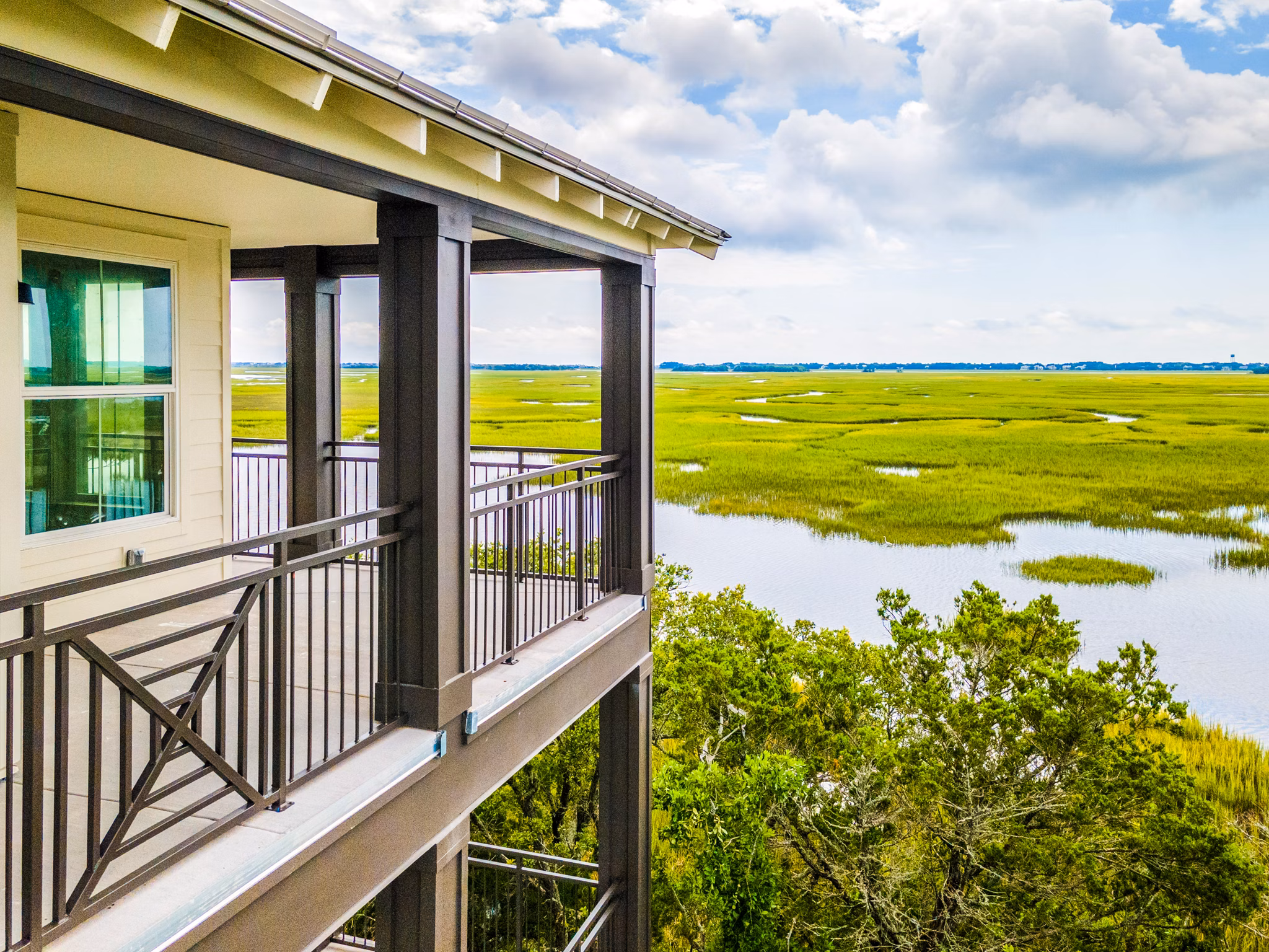 Cozy patio with modern furniture at Atlantic Beach House Apartments, perfect for relaxation and gatherings