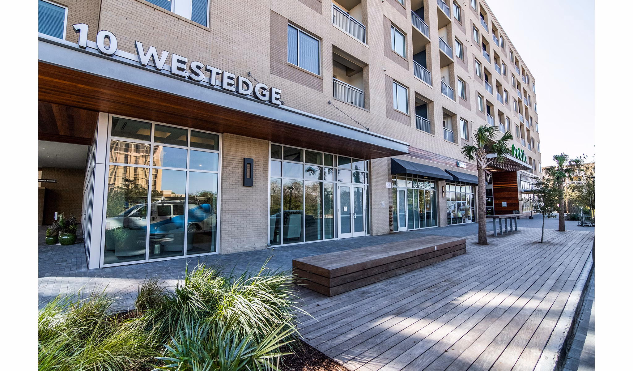 10 WestEdge Apartments: Contemporary high-rise luxury apartments in Charleston, featuring a sleek glass with city views