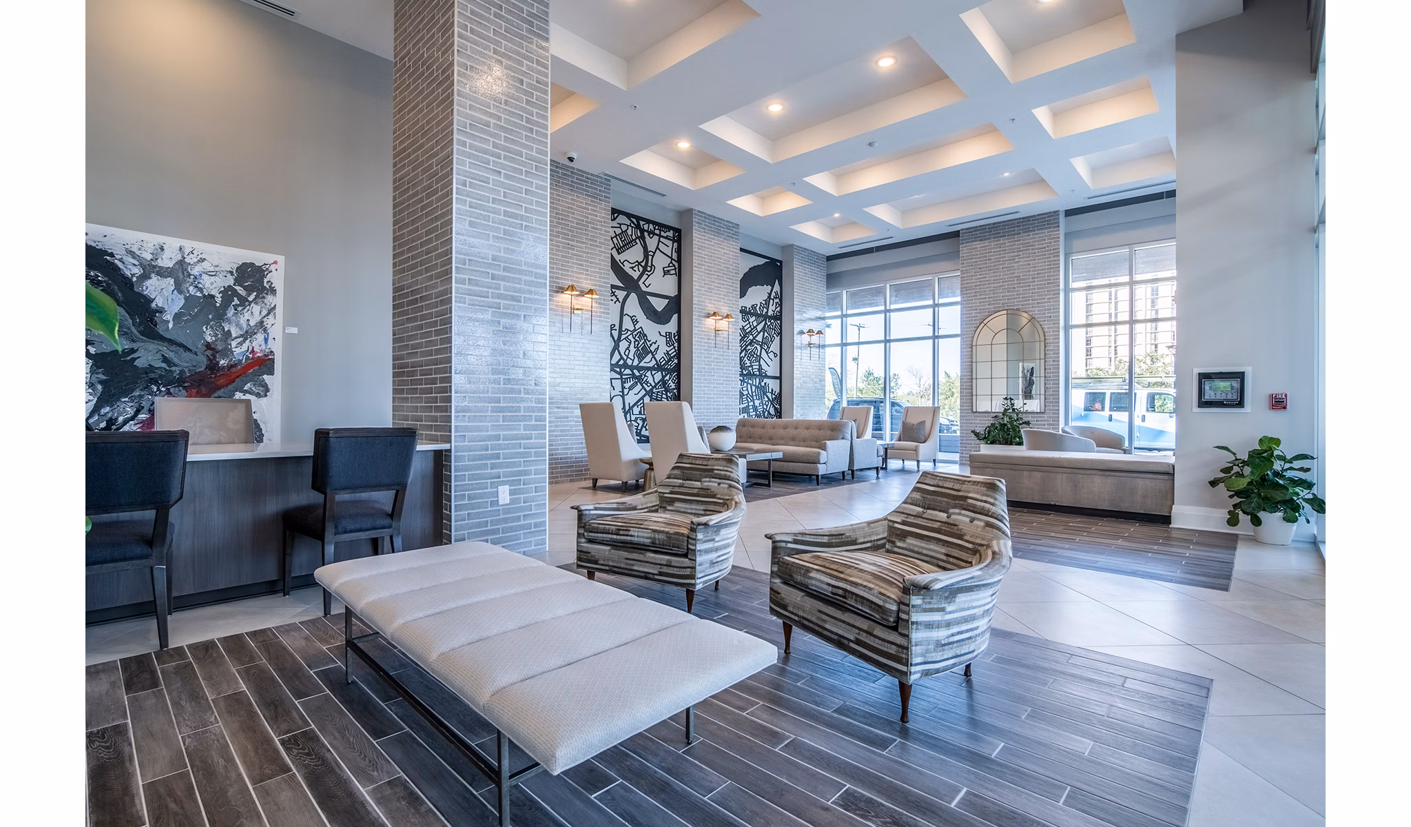 Spacious clubhouse lobby with modern furnishings at 10 WestEdge Apartments, a Greystar luxury property in Charleston, SC