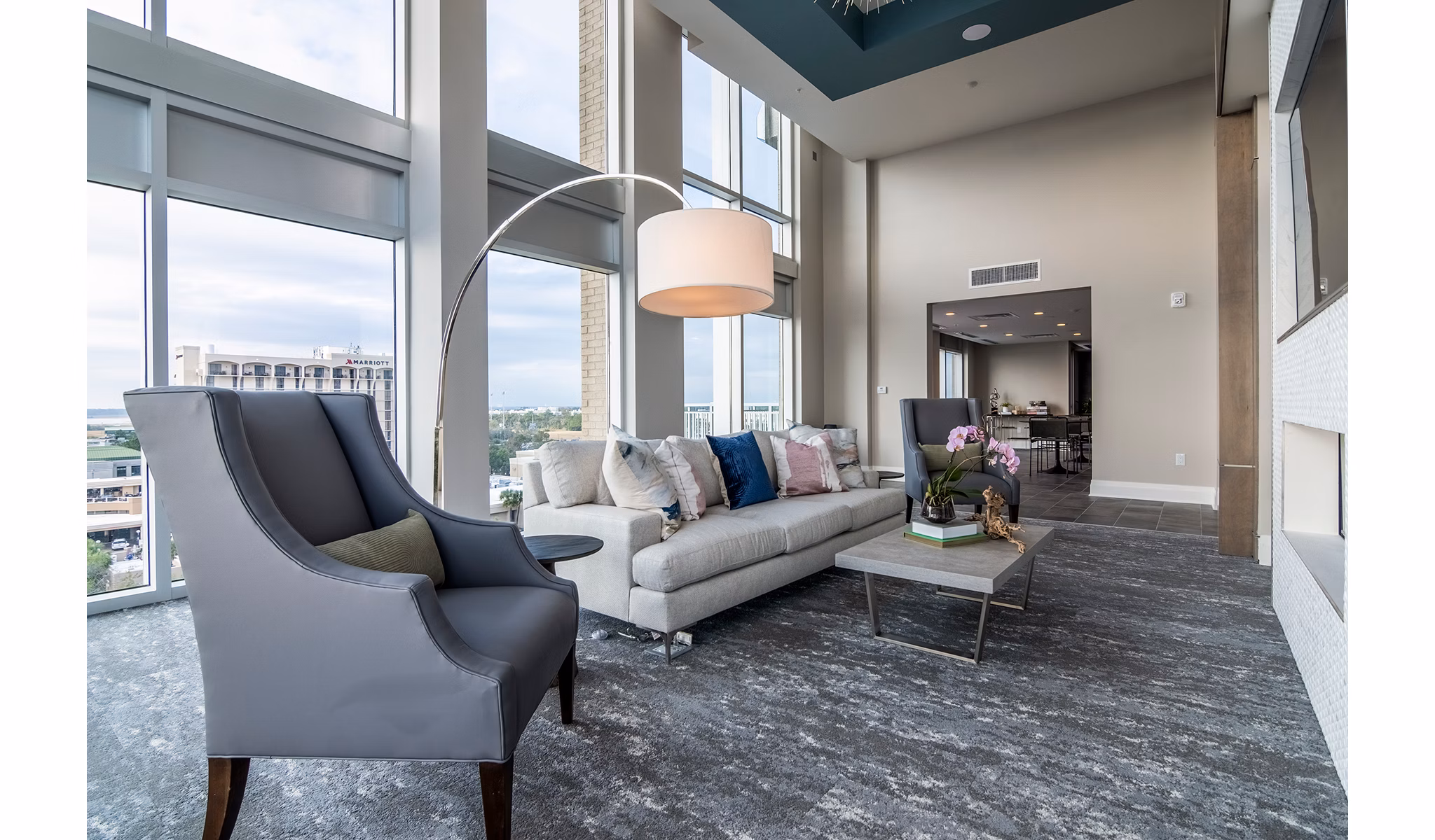 Clubhouse lobby with elegant seating and modern decor at 10 WestEdge Apartments