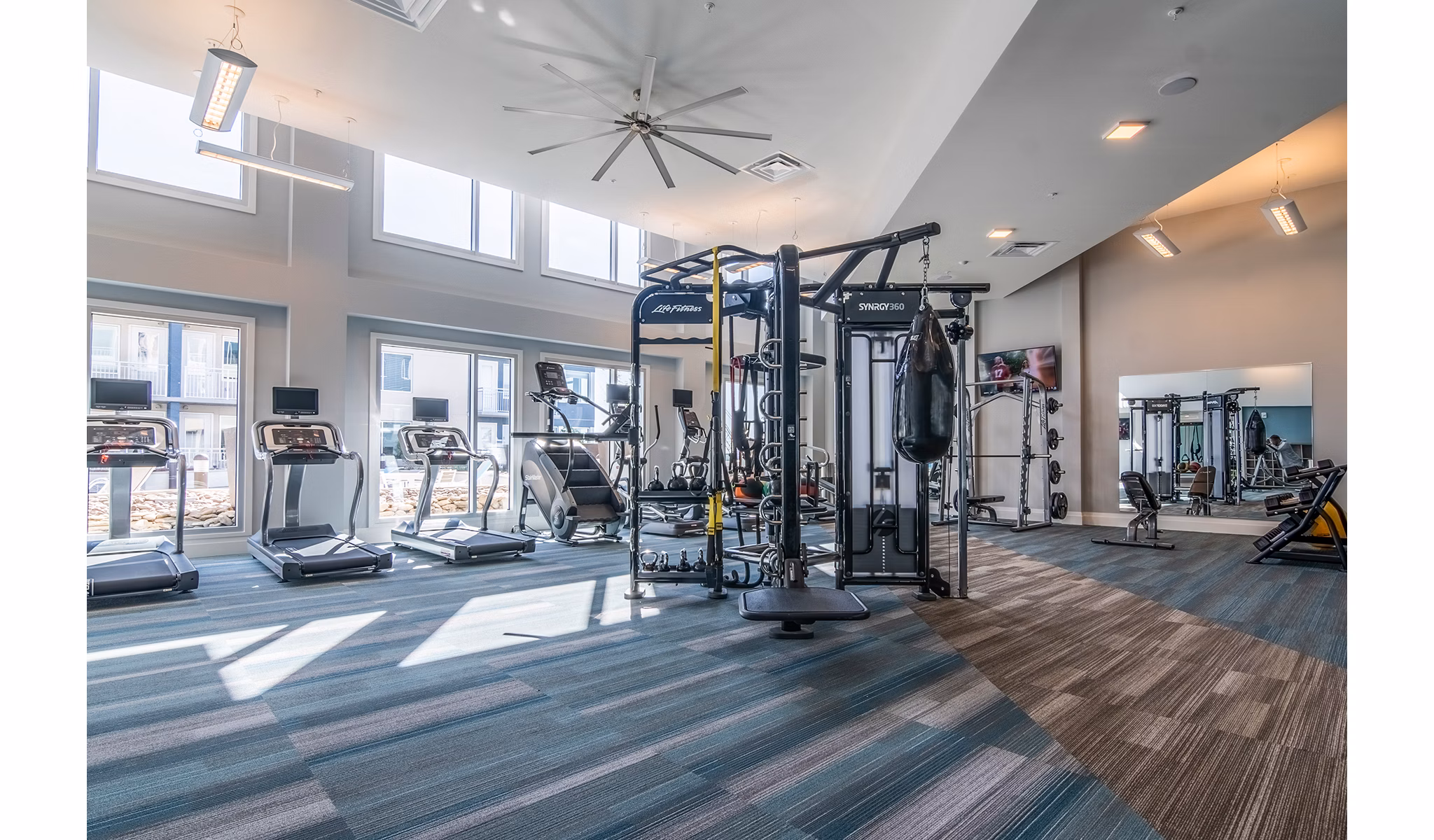 Modern fitness center with state-of-the-art equipment at 10 WestEdge Apartments