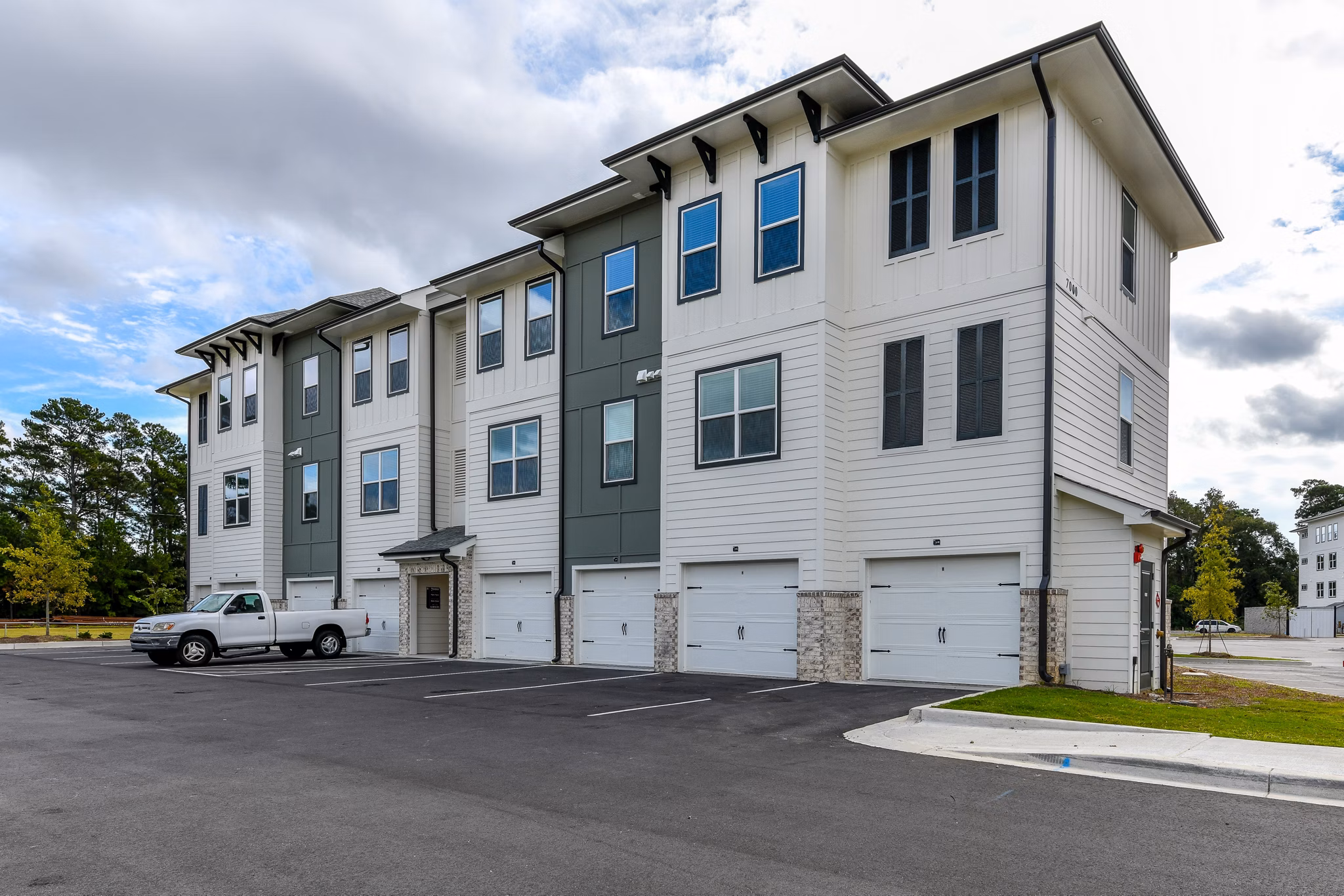 Highland Exchange: Elegant modern luxury apartments view in a vibrant neighborhood