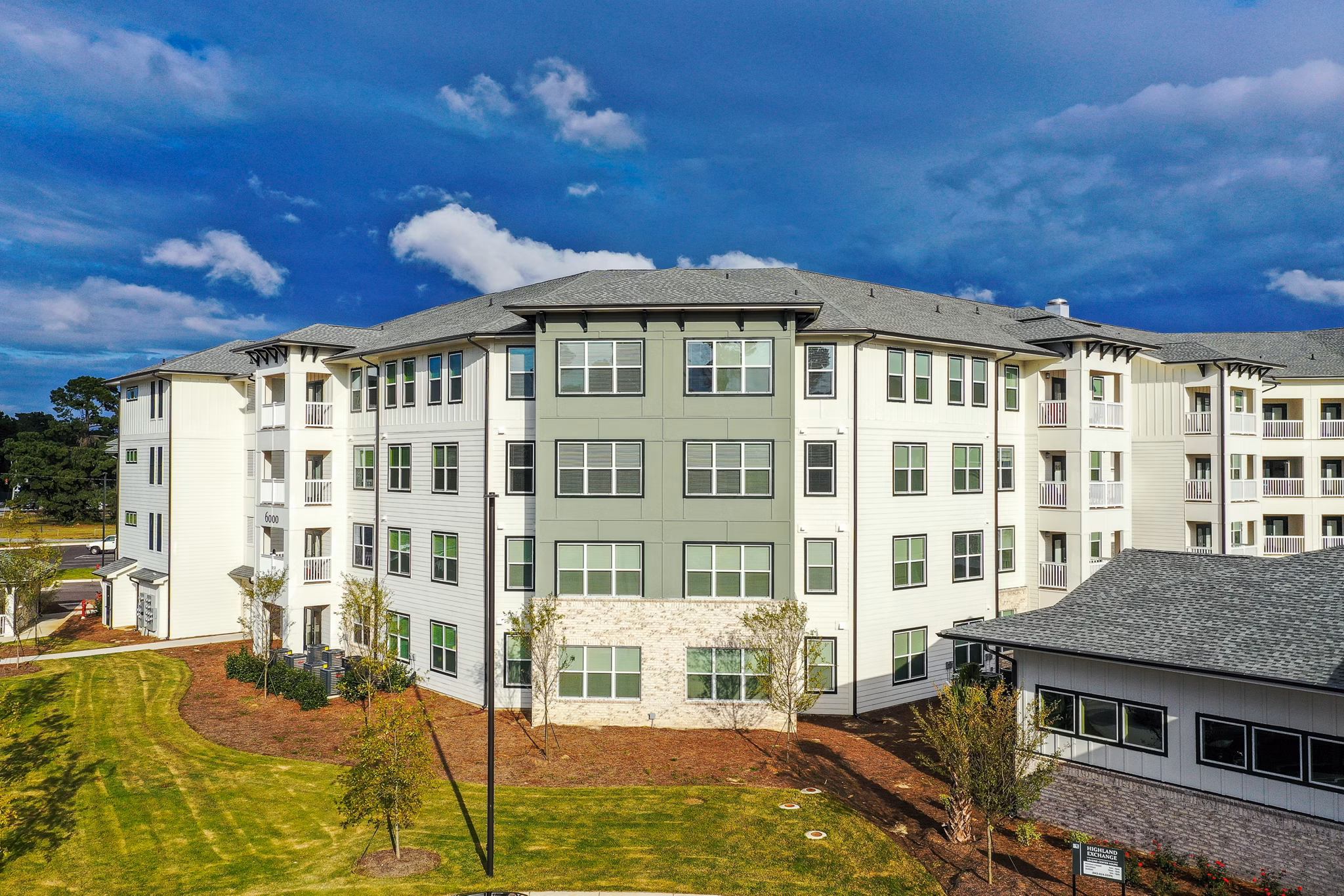 Luxurious open-concept living area with modern furnishings in Greystar luxury apartments