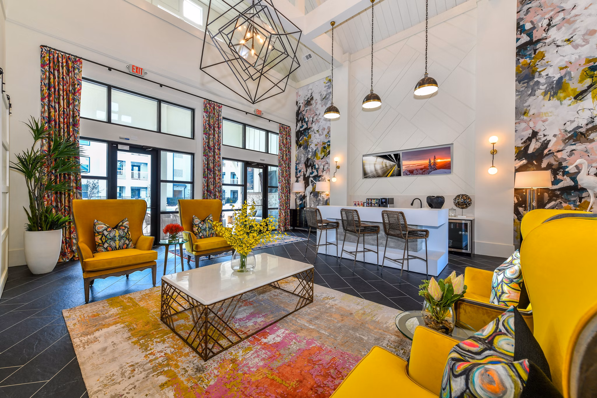 Elegant clubhouse with modern design at Highland Exchange Apartments, perfect for social gatherings and community events