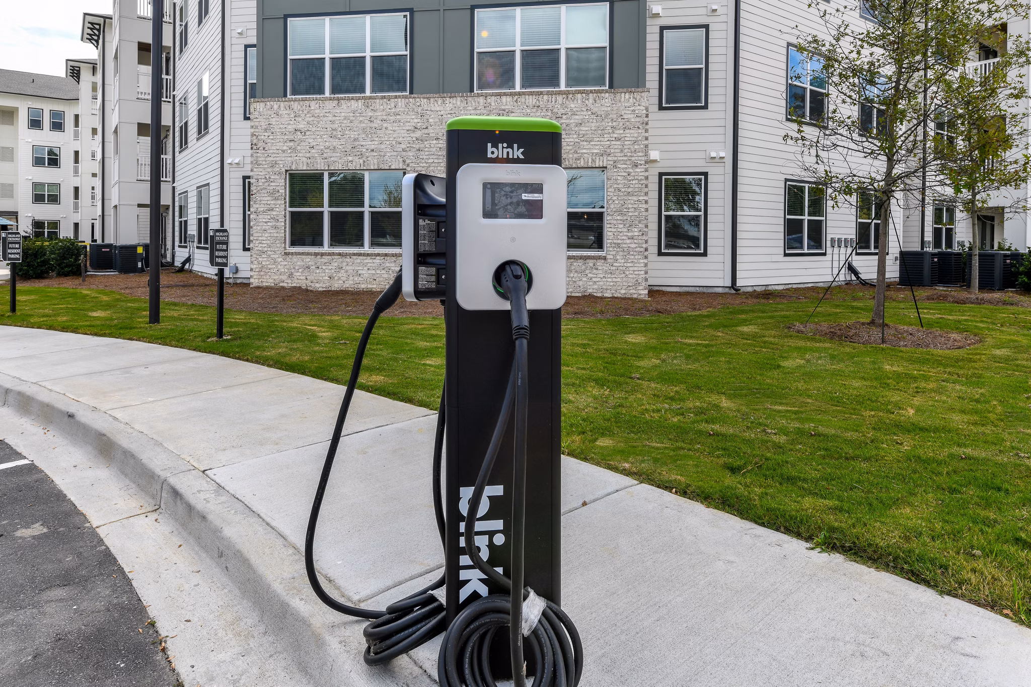 Car care station at Highland Exchange Apartments providing convenient vehicle maintenance amenities for residents