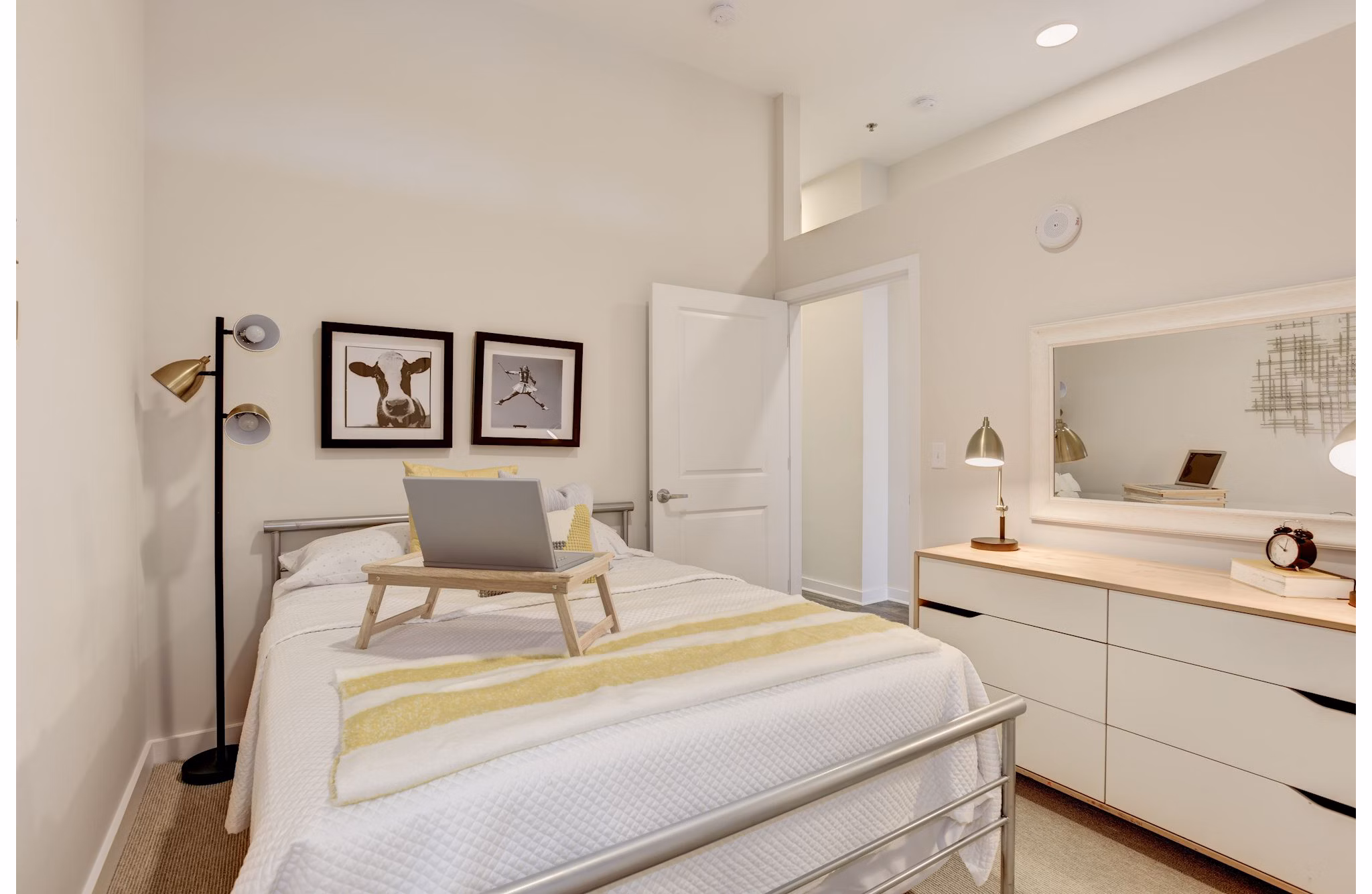 Elegant bedroom with modern decor at 225 N Calvert Apartments
