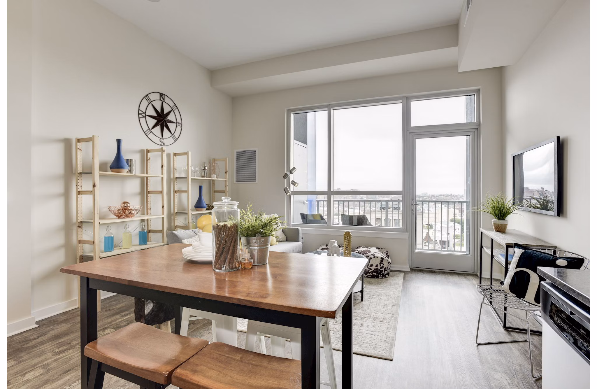 Dining room with elegant decor and wooden furniture at 225 N Calvert Apartments, Greystar luxury apartments in vibrant neighborhood