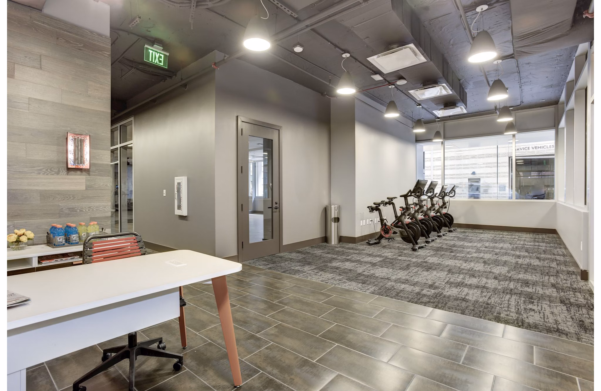 State-of-the-art fitness center with modern equipment at 225 N Calvert Apartments, enhancing your luxury living experience
