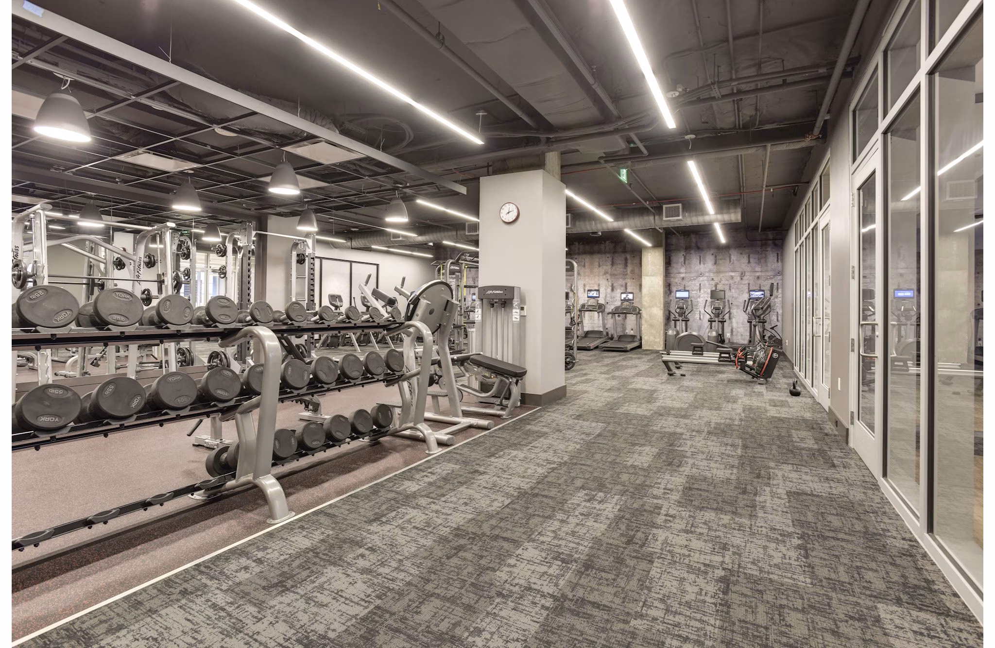 State-of-the-art fitness center with modern equipment at 225 N Calvert Apartments