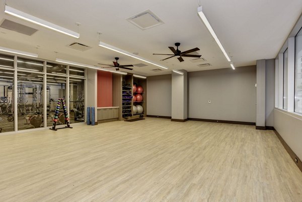 yoga and spin area at 225 N Calvert Apartments