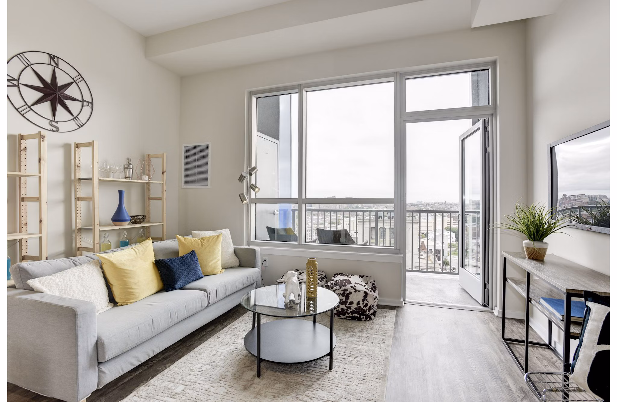 Spacious living room with modern decor at 225 N Calvert Apartments