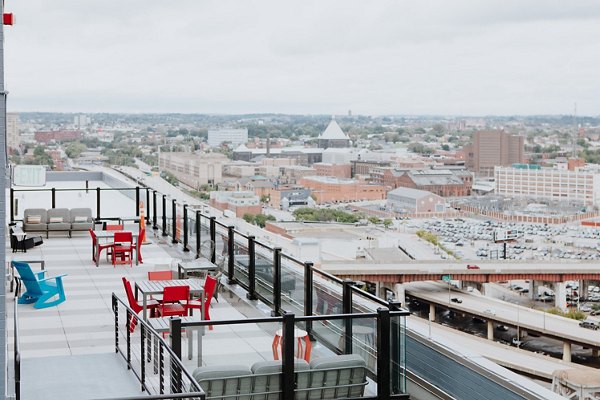 rooftop deck with seating at 225 N Calvert Apartments