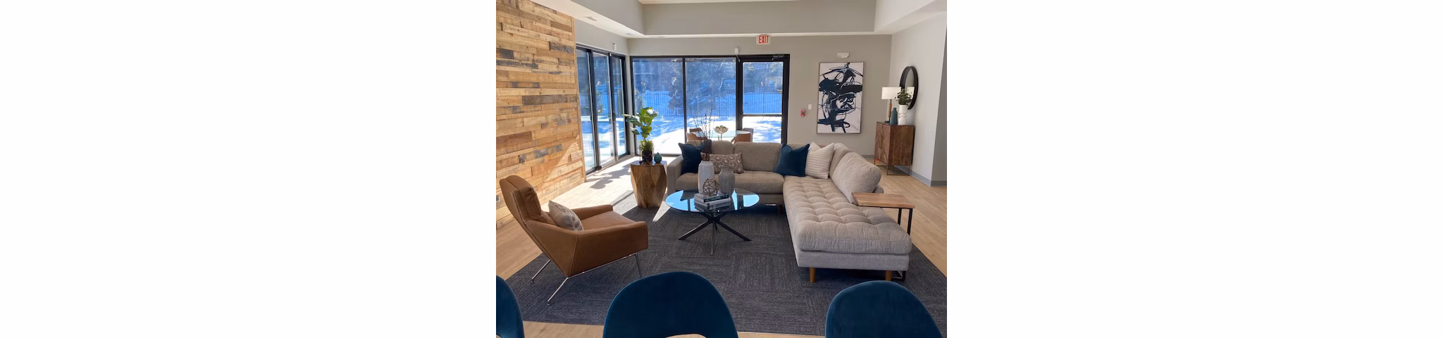 Modern clubhouse with stylish seating at Orion Elk Grove Apartments, offering luxury amenities for residents