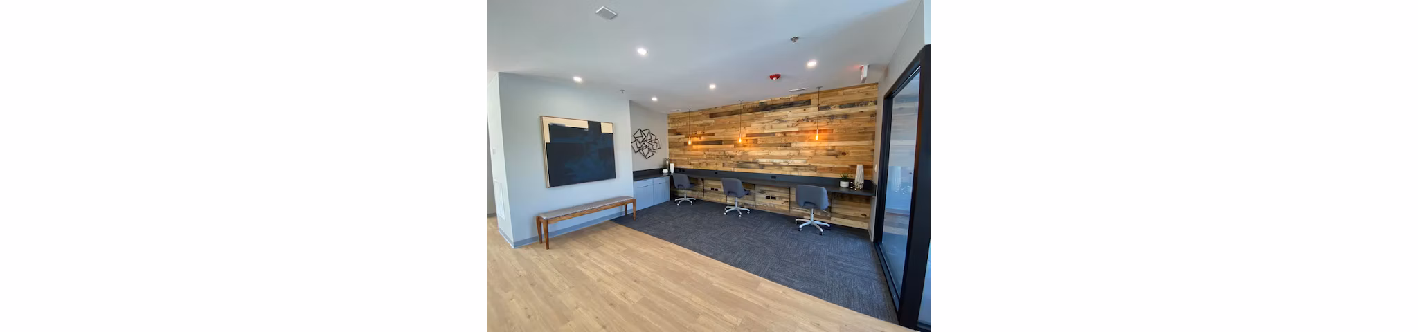Clubhouse featuring stylish lounge seating and modern design at Orion Elk Grove Apartments A space for residents to relax and socialize