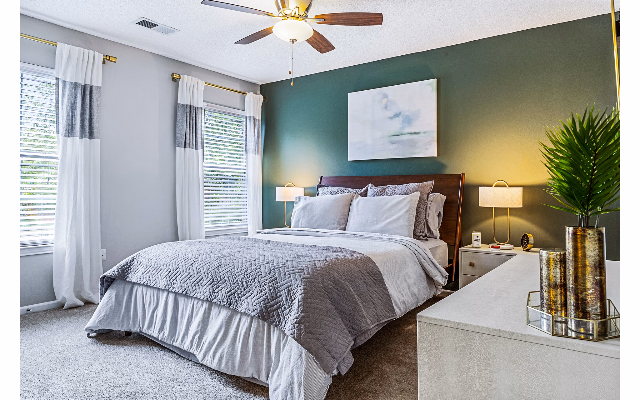 Bright bedroom with contemporary design at Vista Commons Apartments