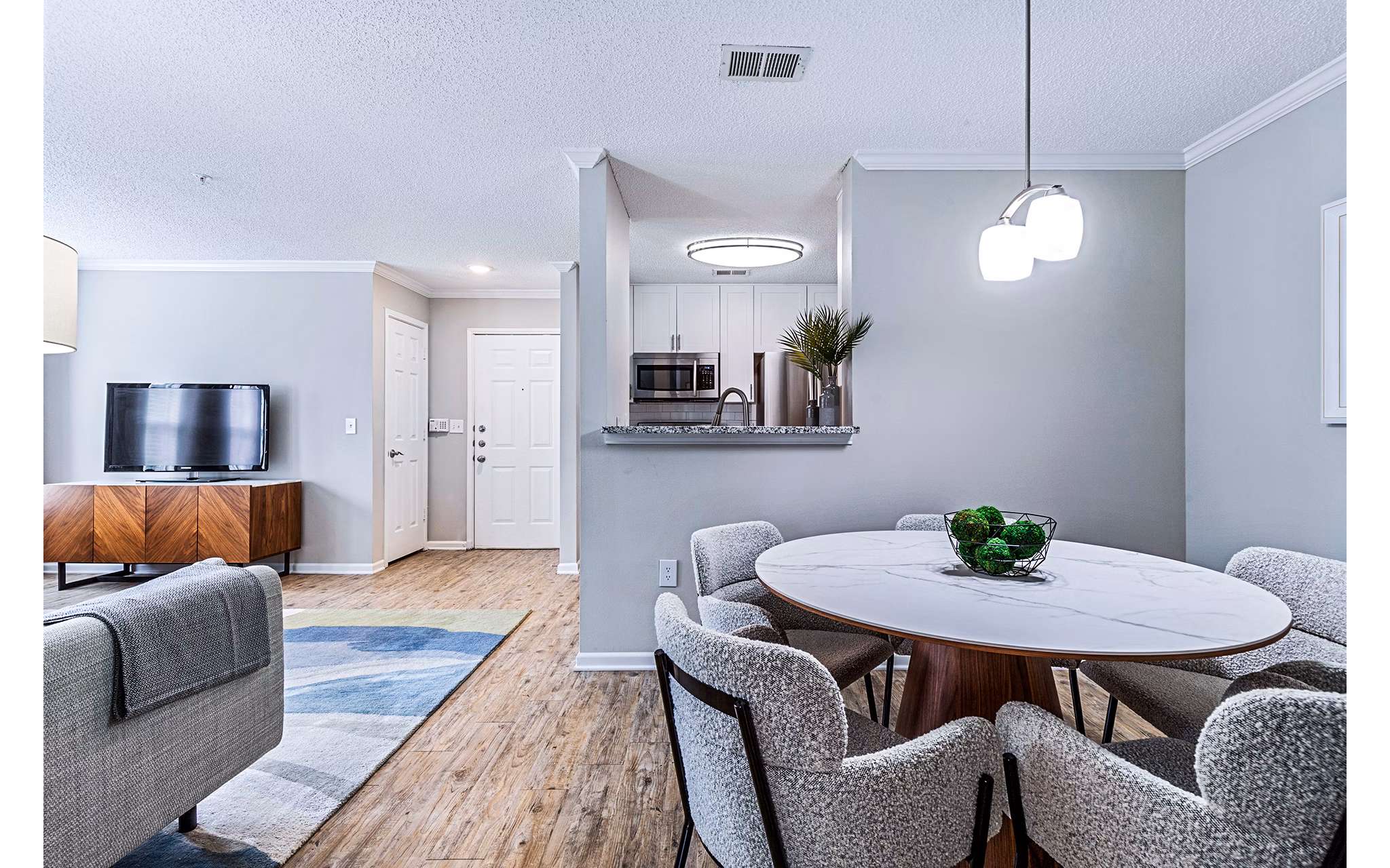Elegant dining room with modern furnishings at Vista Commons Apartments