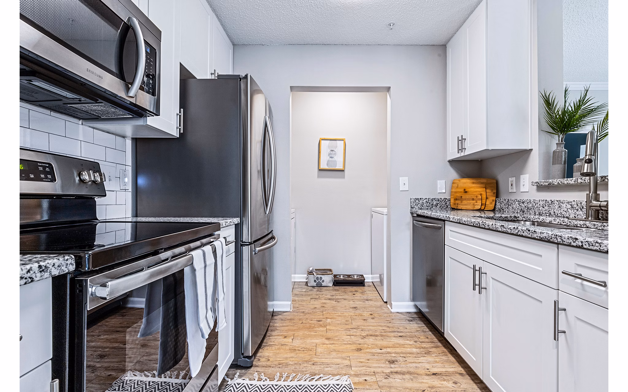 Stylish kitchen with modern appliances at Vista Commons Apartments