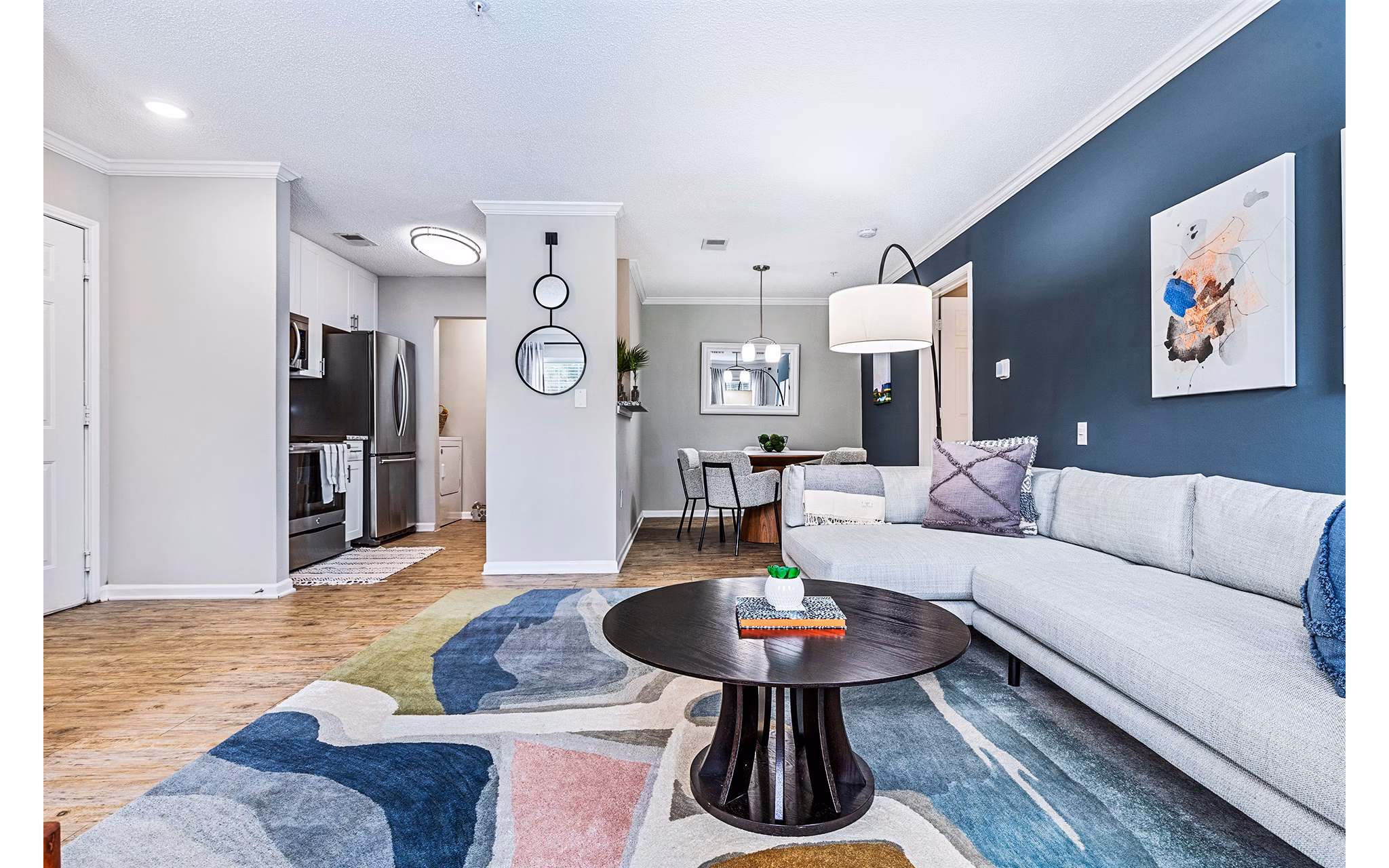 Bright living room with modern decor at Vista Commons Apartments Find luxury apartments with spacious interiors