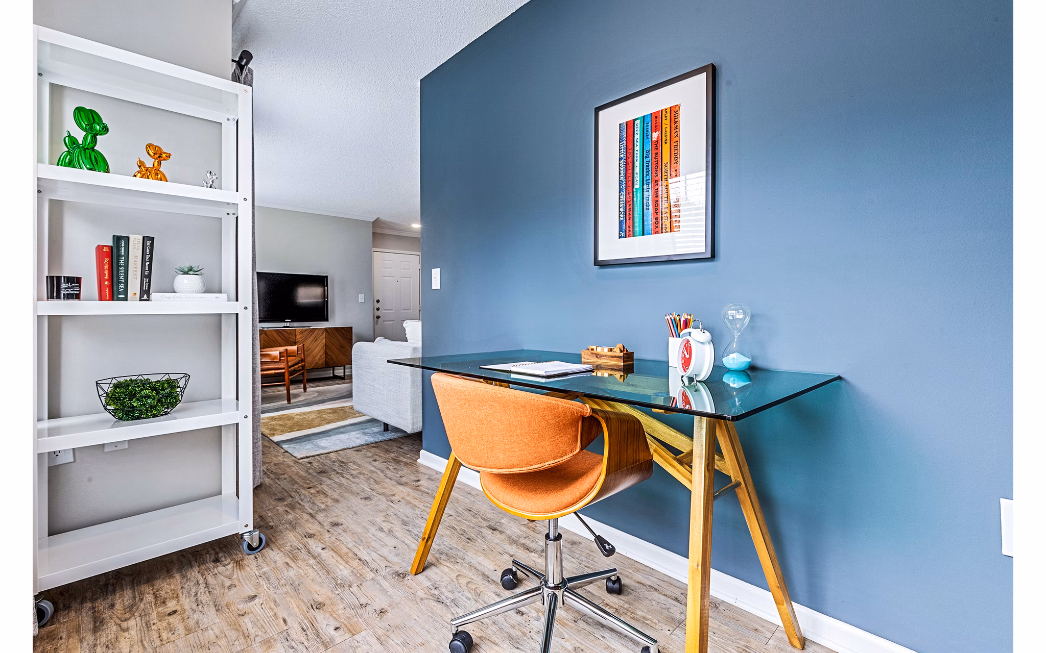 Home office area with ergonomic desk and sleek dÃ©cor in Vista Commons Apartments