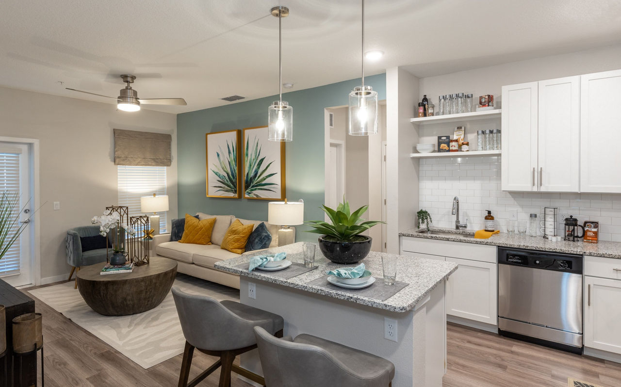 Calirosa Apartments: Modern kitchen with stainless steel appliances