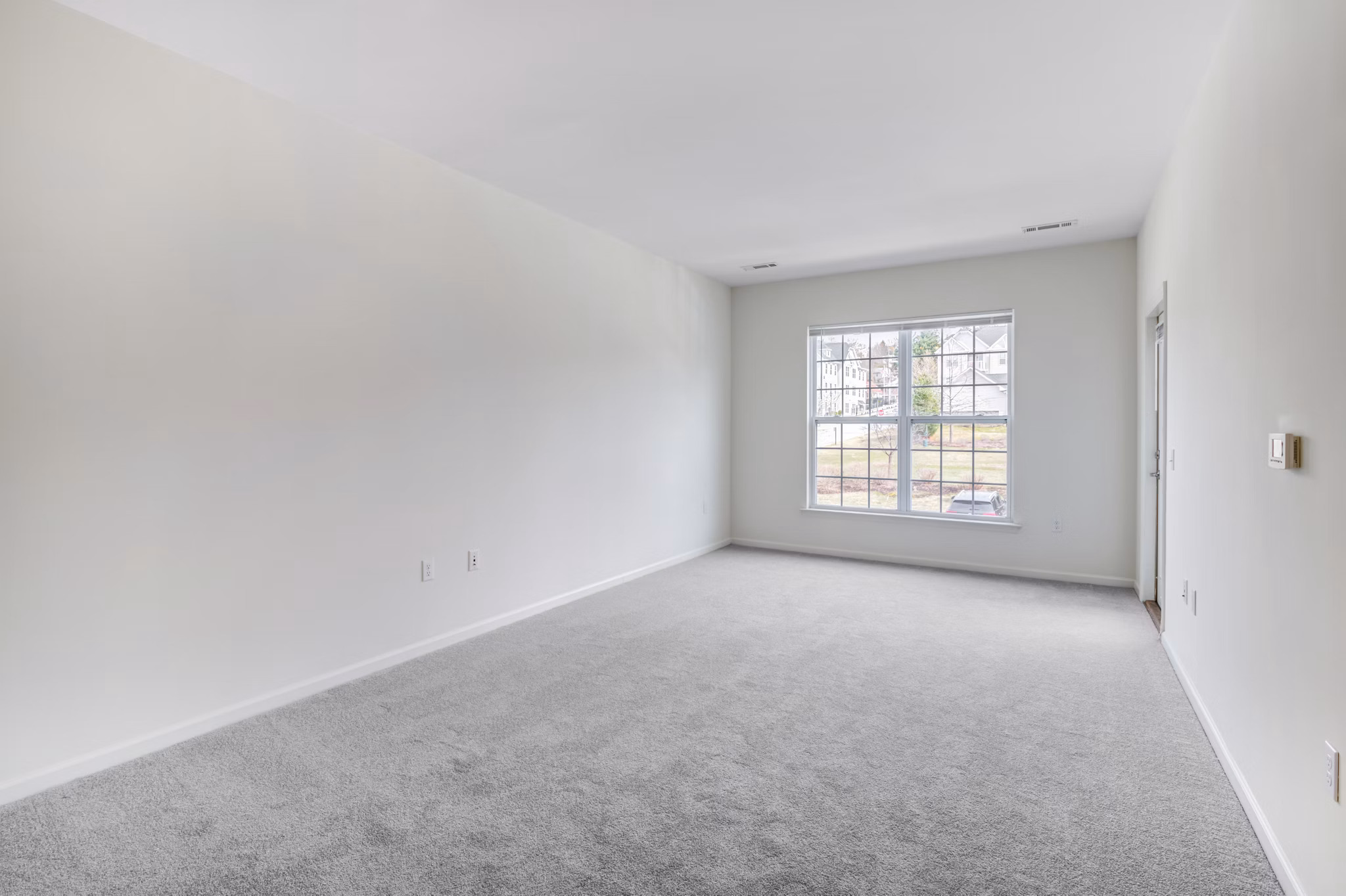 Cozy bedroom with modern decor at Terraces on the Hudson Apartments