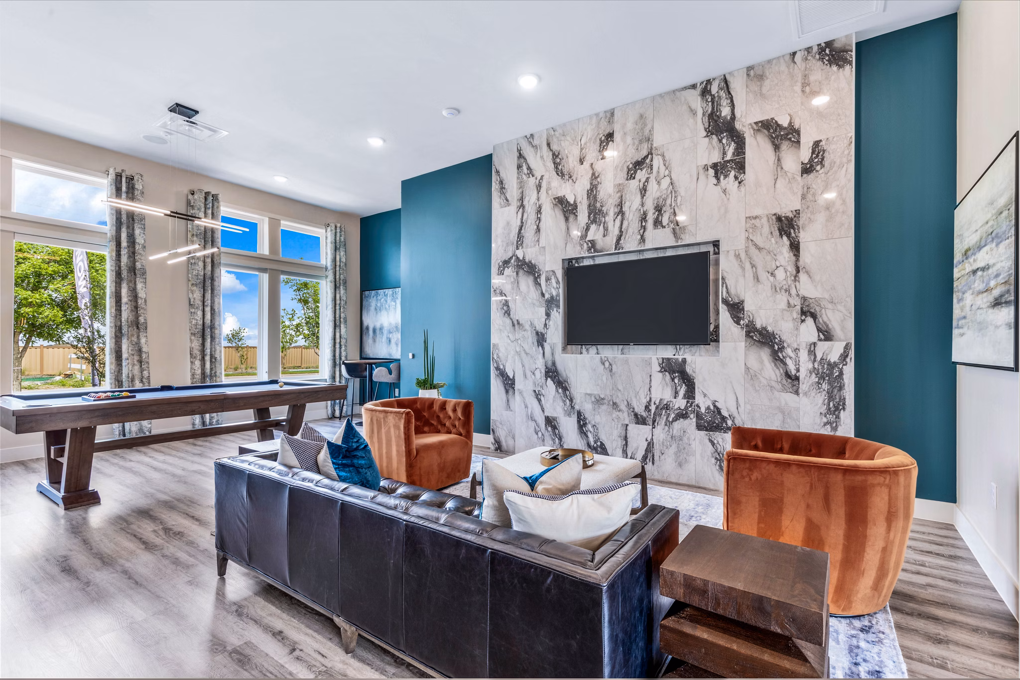 clubhouse game room at Prose Frontier Apartments