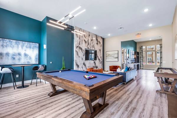 clubhouse game room at Prose Frontier Apartments