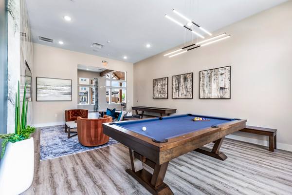clubhouse game room at Prose Frontier Apartments