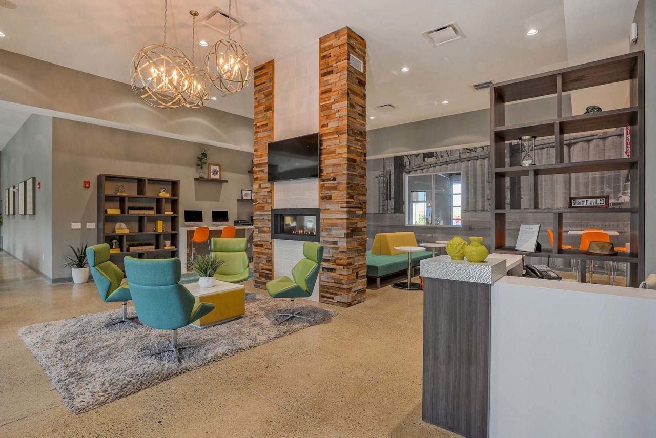 Modern clubhouse with sleek furnishings at 101 Center Apartments, perfect for hosting events and social gatherings