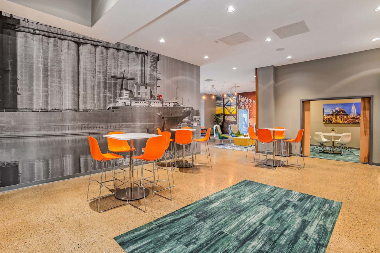 Modern clubhouse featuring stylish seating at 101 Center Apartments: A Greystar luxury apartment community