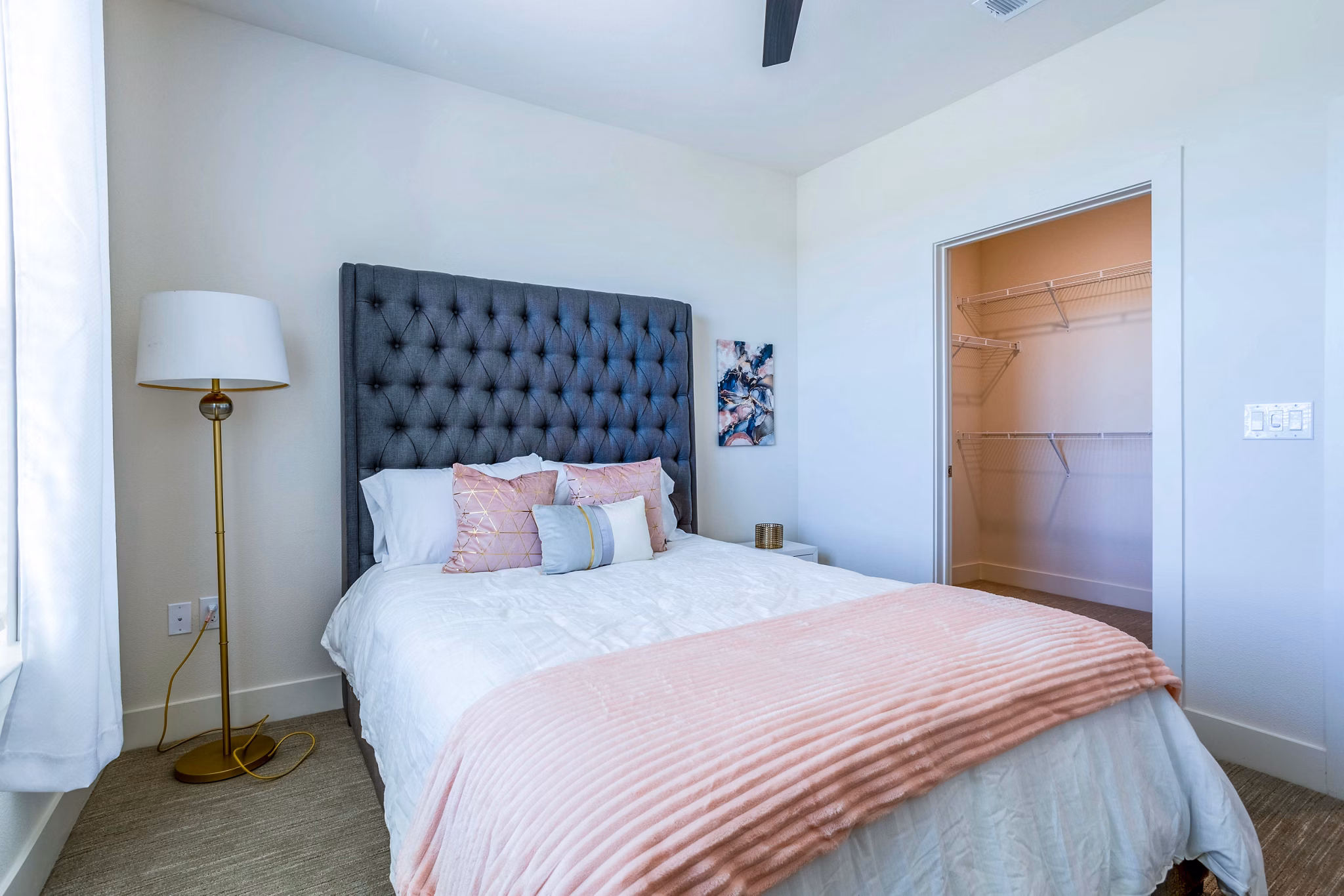 Cozy bedroom with modern decor in Larkspur at Shadow Creek Apartments