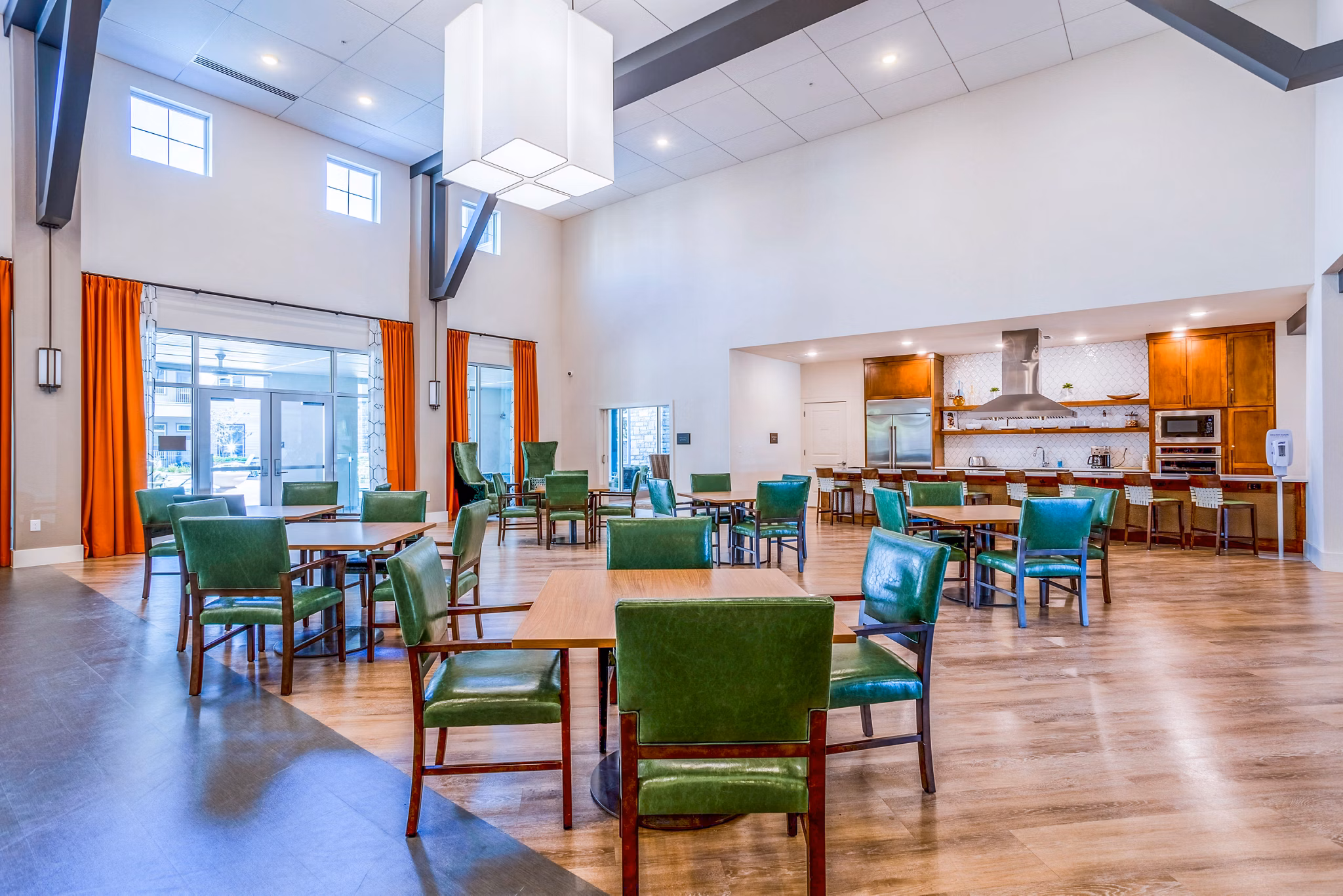 Clubhouse featuring modern furnishings and fireplace at Larkspur at Shadow Creek Apartments