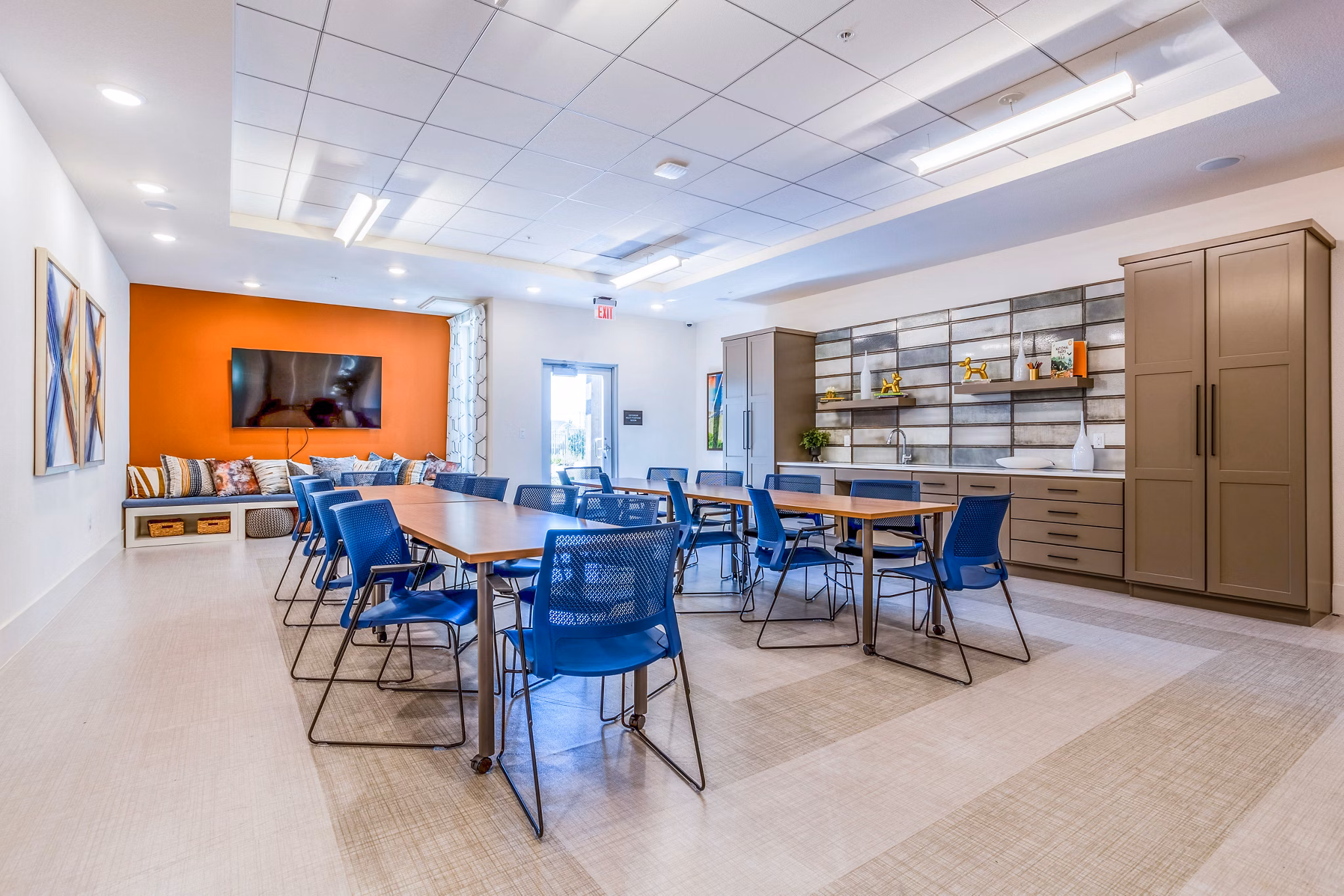 Art room with easels and supplies at Larkspur at Shadow Creek Apartments clubhouse, perfect for creative residents and community events