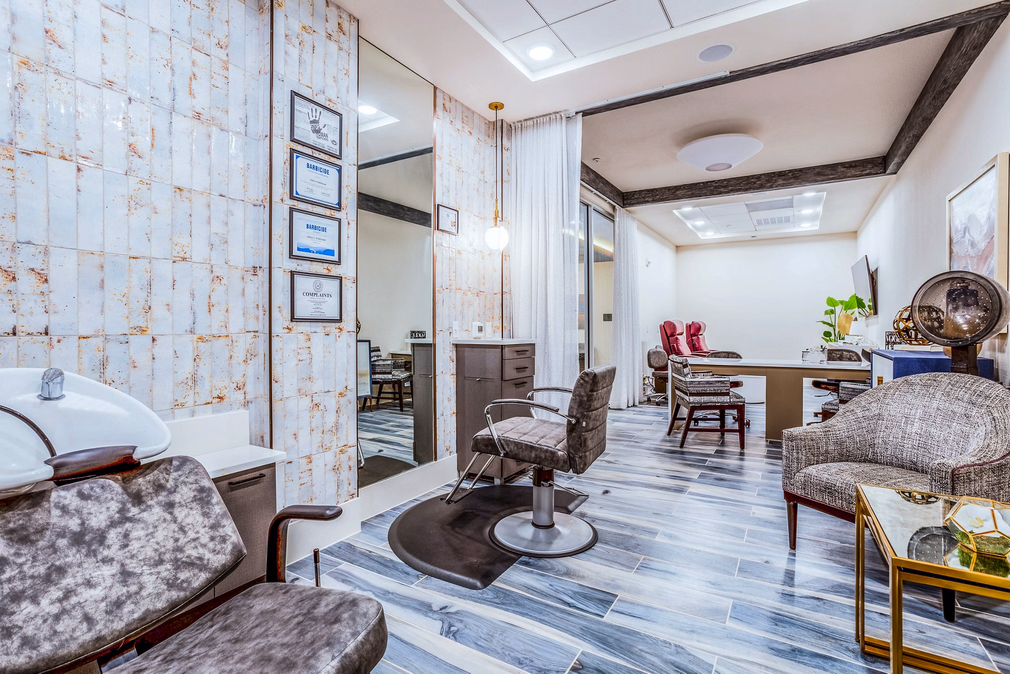 Clubhouse hair salon with modern styling stations at Larkspur at Shadow Creek Apartments Experience luxury living amenities in this premium community
