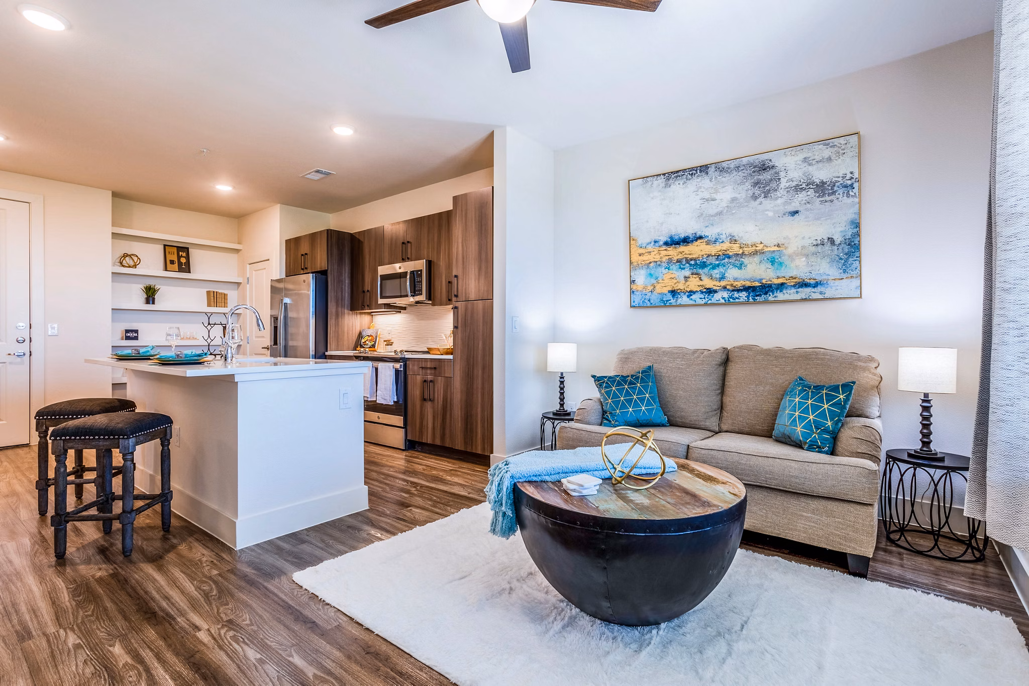Modern living room with stylish furniture and natural light at Larkspur at Shadow Creek Apartments