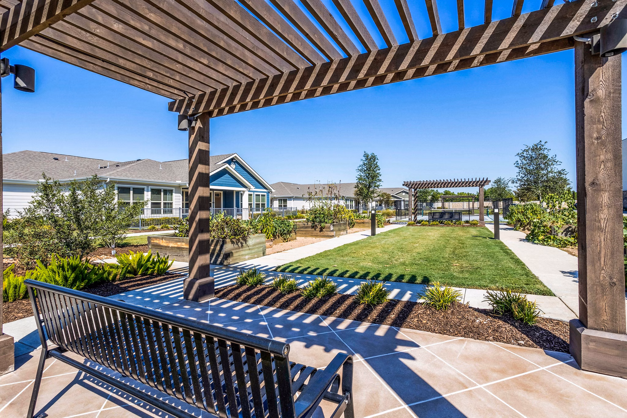 Stylish patio with outdoor seating at Larkspur at Shadow Creek Apartments, perfect for relaxation and social gatherings