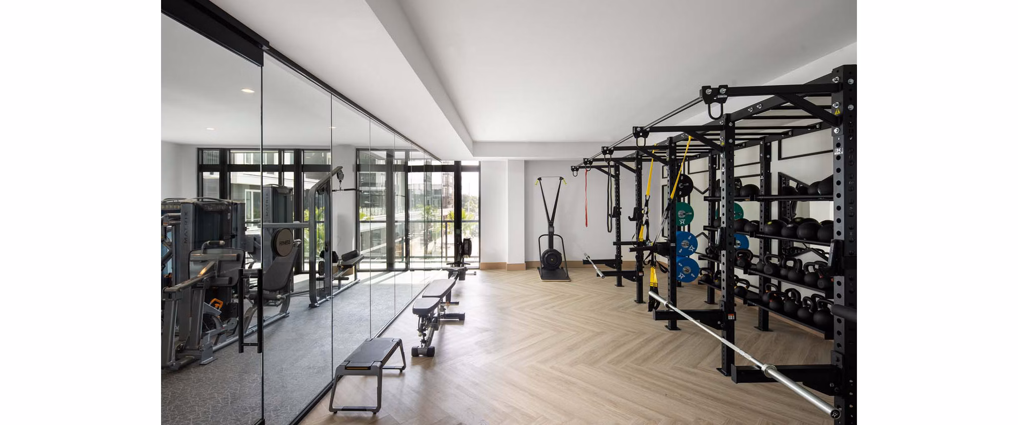 State-of-the-art fitness center featuring modern equipment at Novel Midtown Tampa Apartments