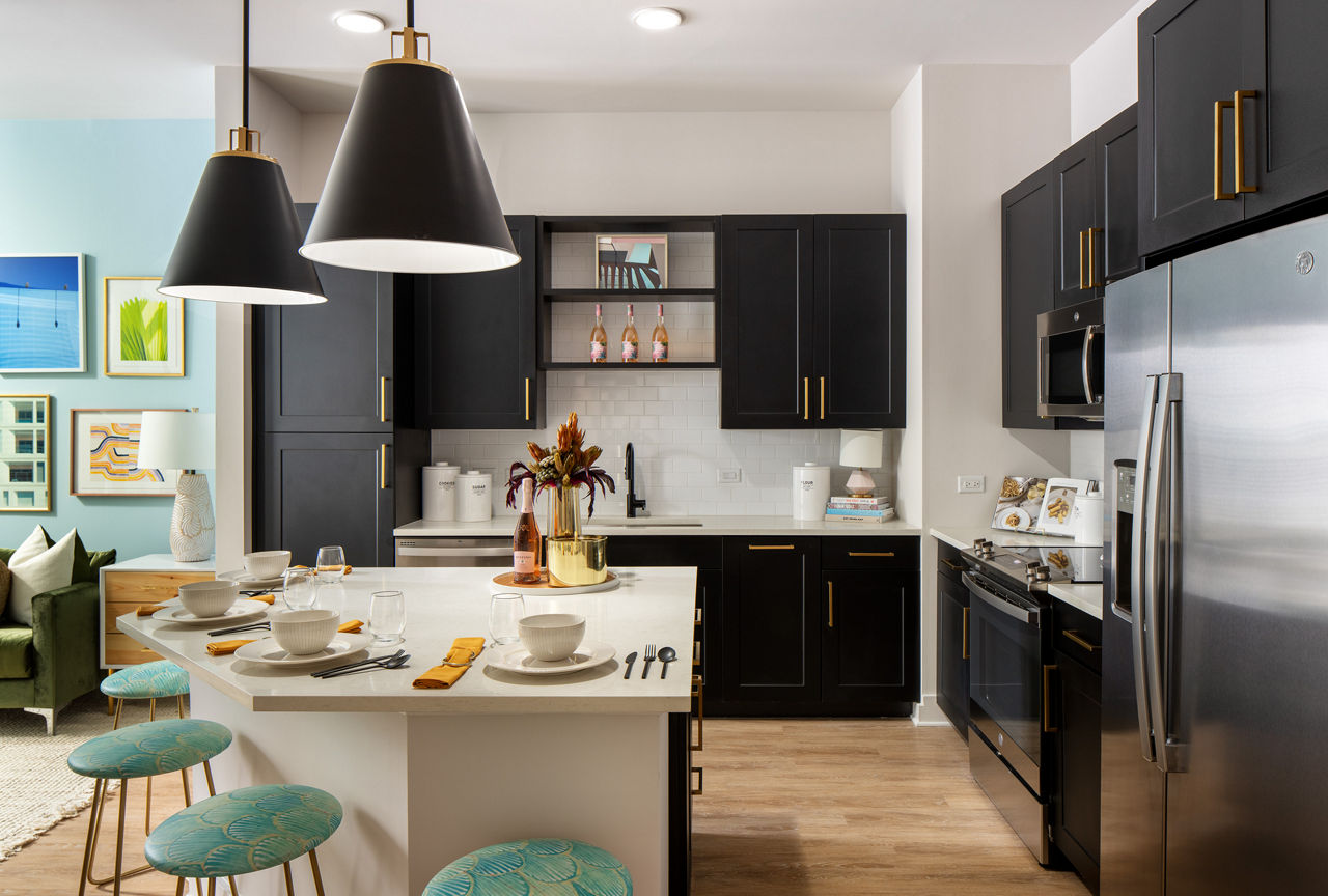 Modern kitchen with stainless steel appliances at Novel Midtown Tampa Apartments
